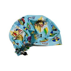 Dogs. at beach scrub cap