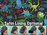 Dinos. on navy scrub cap