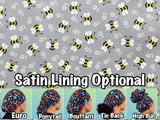 Bees on gray scrub cap